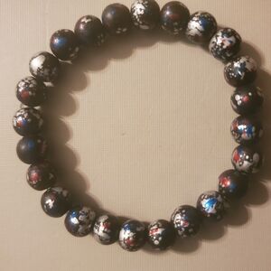 Handmade by my daughter. Beautiful black graffiti beaded bracelet.
